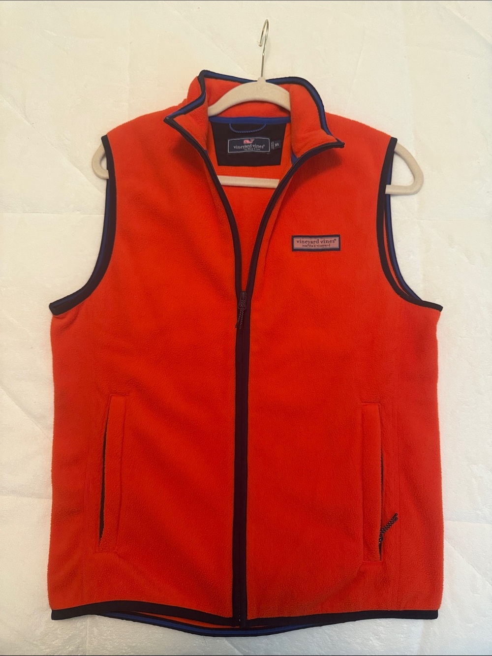Vineyard Vines Harbor Fleece Vest with Navy Trim in color cocktail sauce